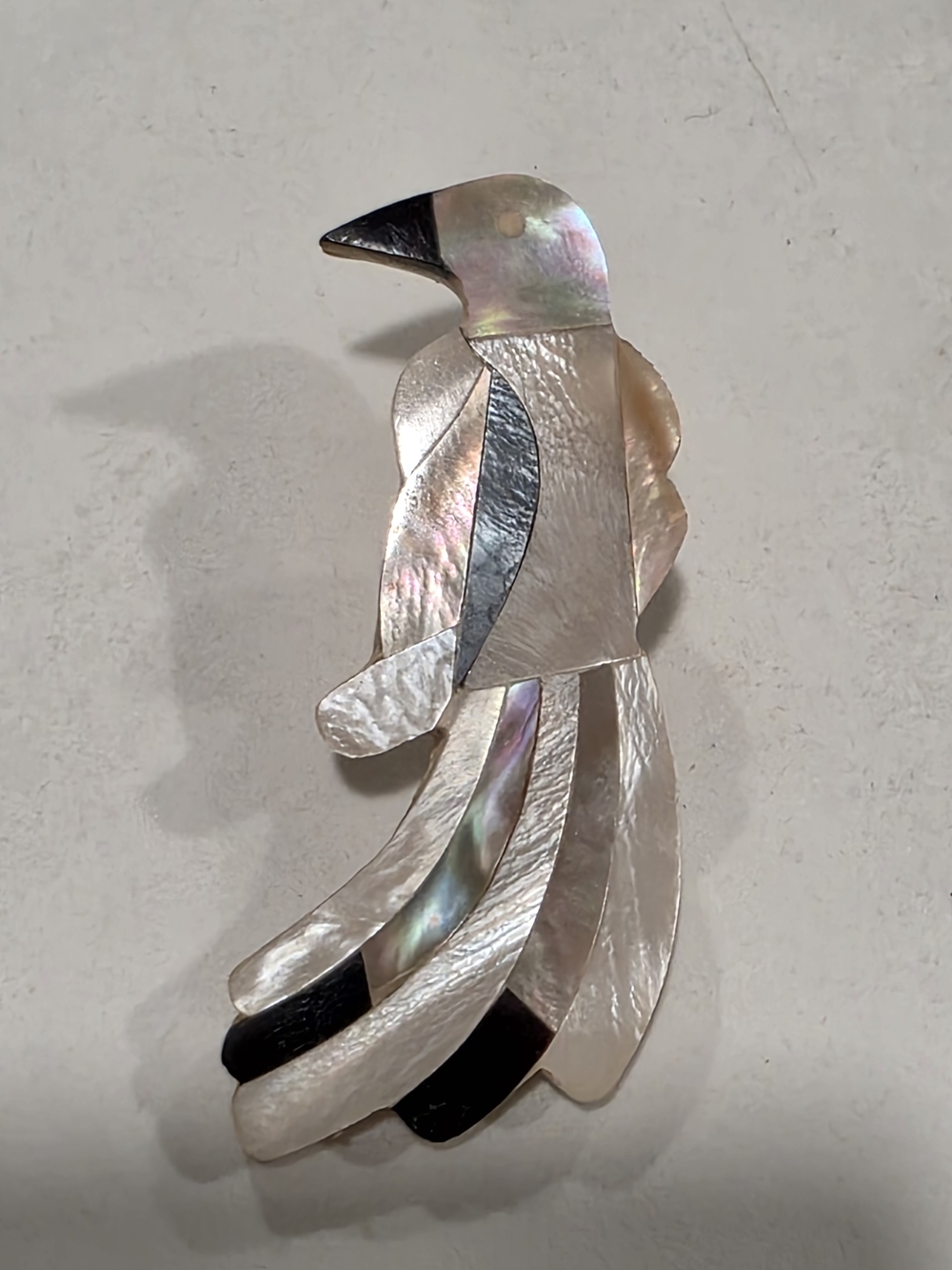 Vintage Mother-of-Pearl Parrot Brooch with Iridescent White and Black Accents